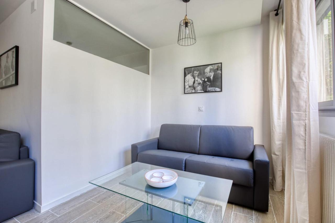 Charming Apartment In The Heart Of The 19Th Paris Exterior photo